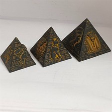 Elegant Egyptian decor with pyramids, hieroglyphs, and pharaoh motifs, ideal gif picture